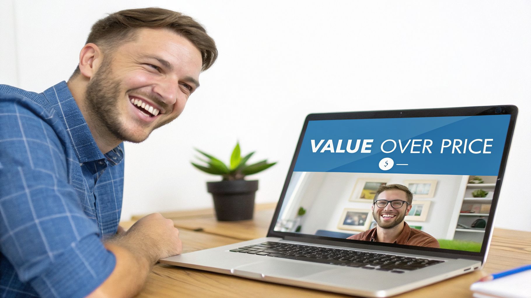 A man happily watches a laptop displaying 'VALUE OVER PRICE' and a video call with another smiling man.