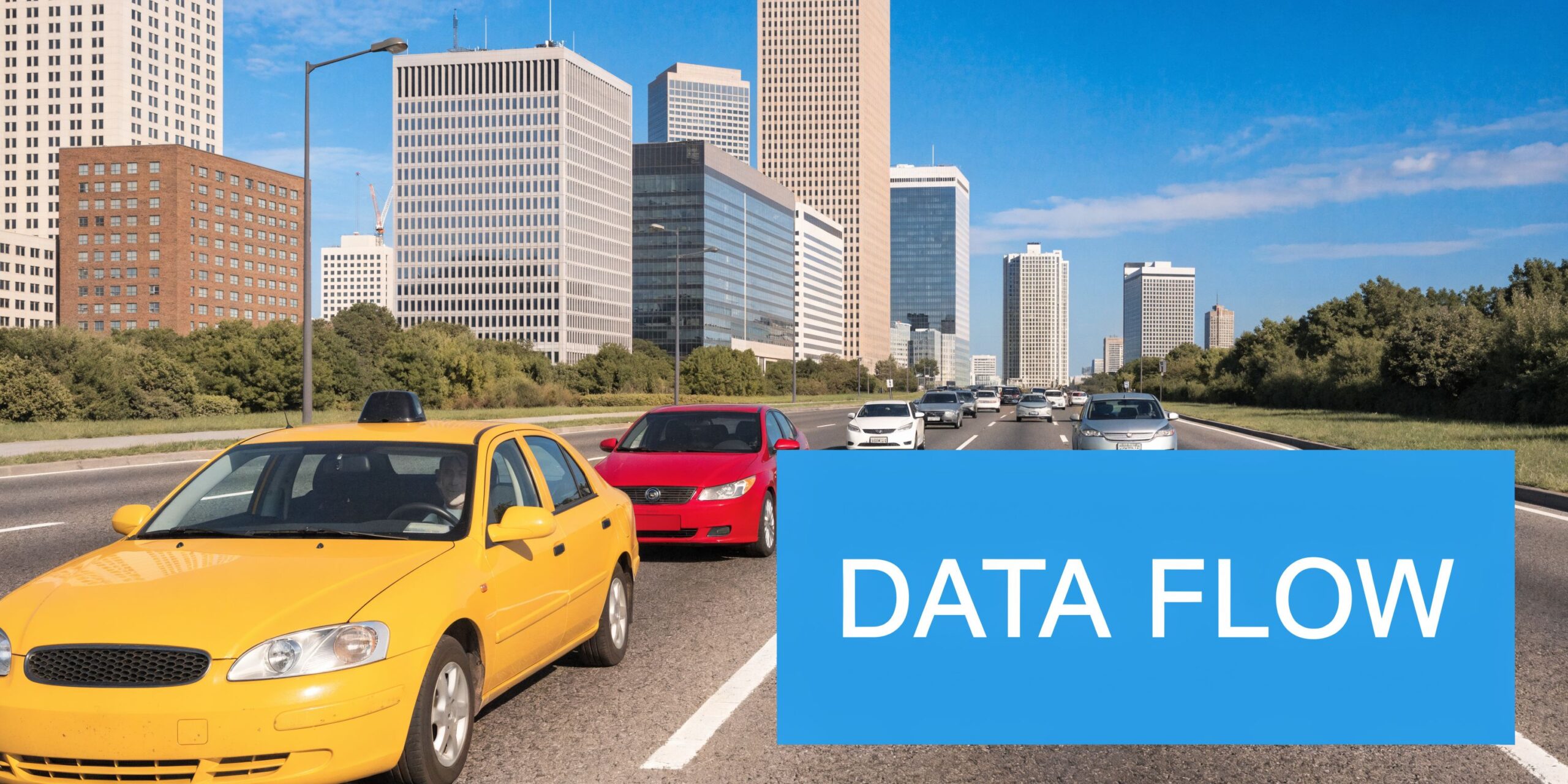 A yellow taxi driving on a multi-lane highway toward a modern cityscape with tall office buildings.