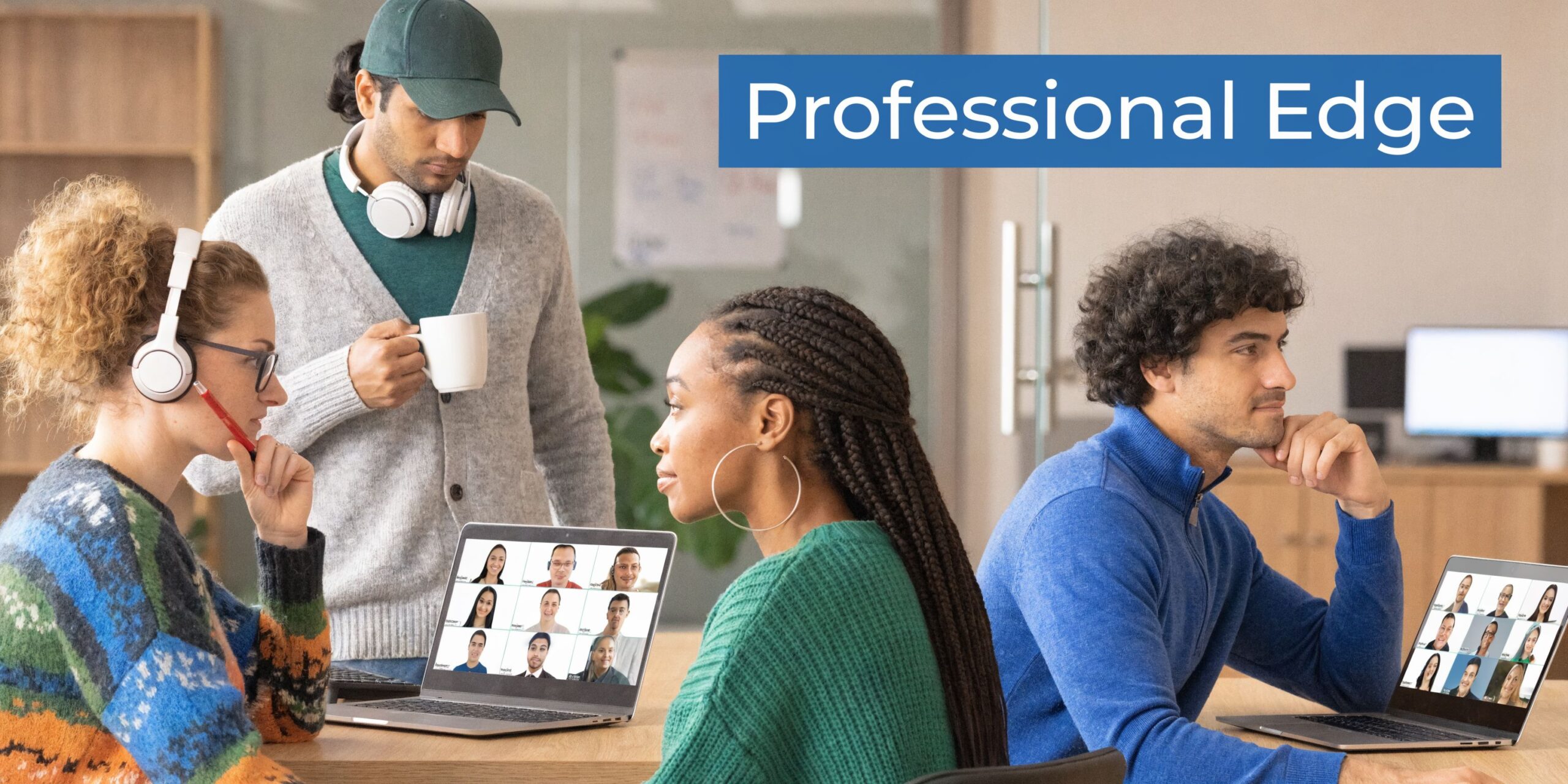 A diverse group of professionals working together in an office while participating in a video conference call.