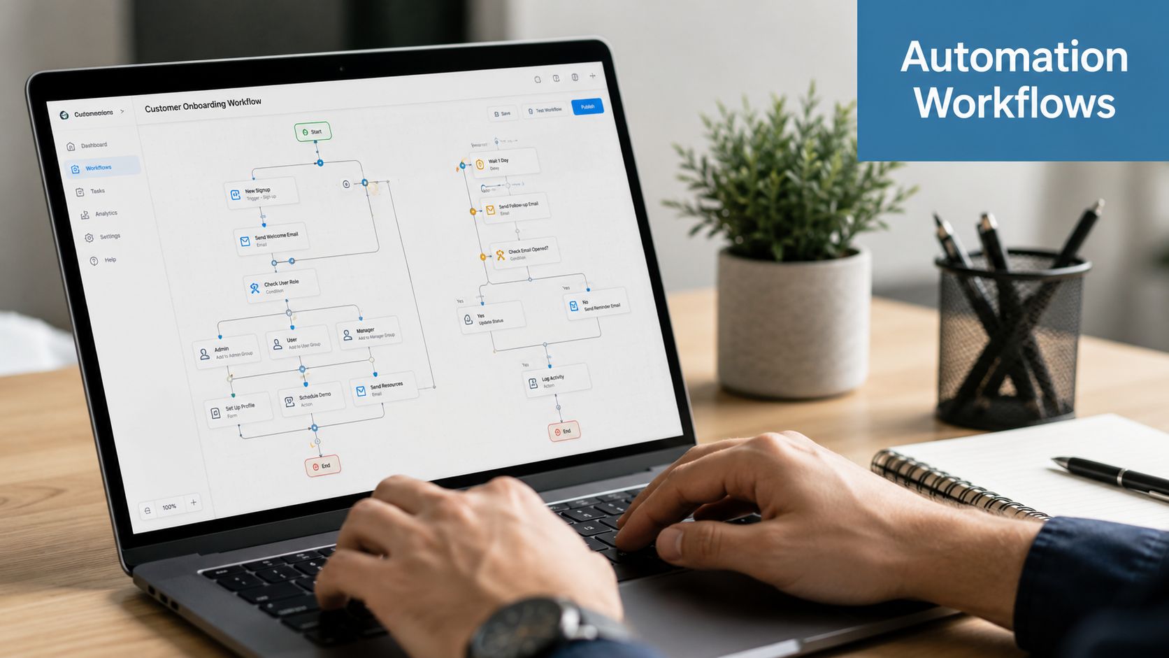 A person using a laptop to design an automation workflow for customer onboarding on a software platform.